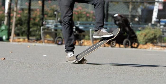 Tre flip (360 flips) on a Skateboard